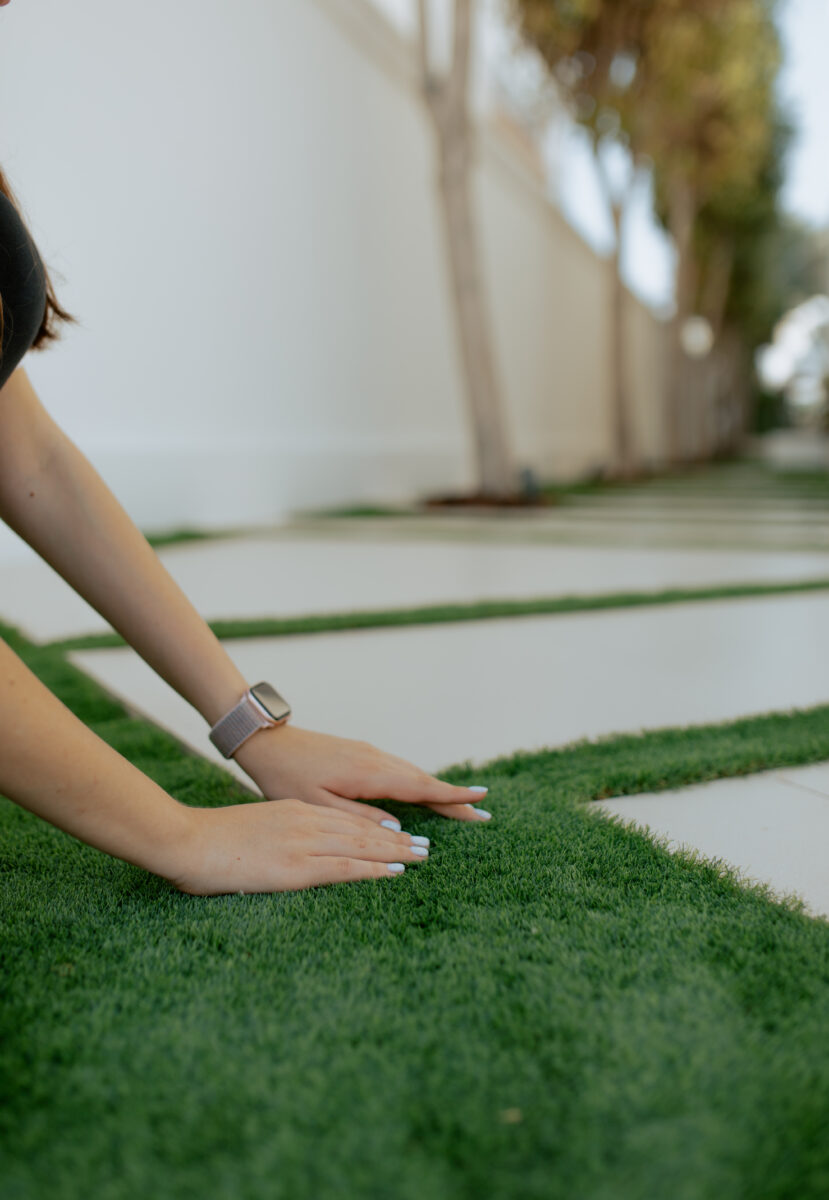 Artificial grass landscaping at a private villa garden in Emirates Hills, Dubai by Grand Builder